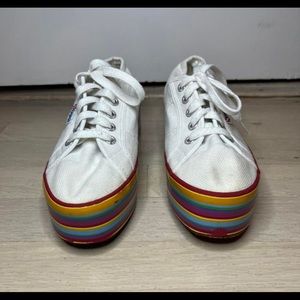 White Supergas with a rainbow platform
Slightly worn